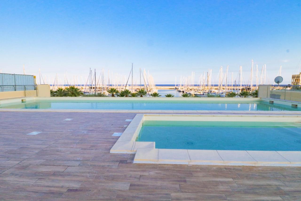 H11 Luxury 12B Porto - Piscina - Jacuzzi Leilighet Santo Stefano al Mare Eksteriør bilde